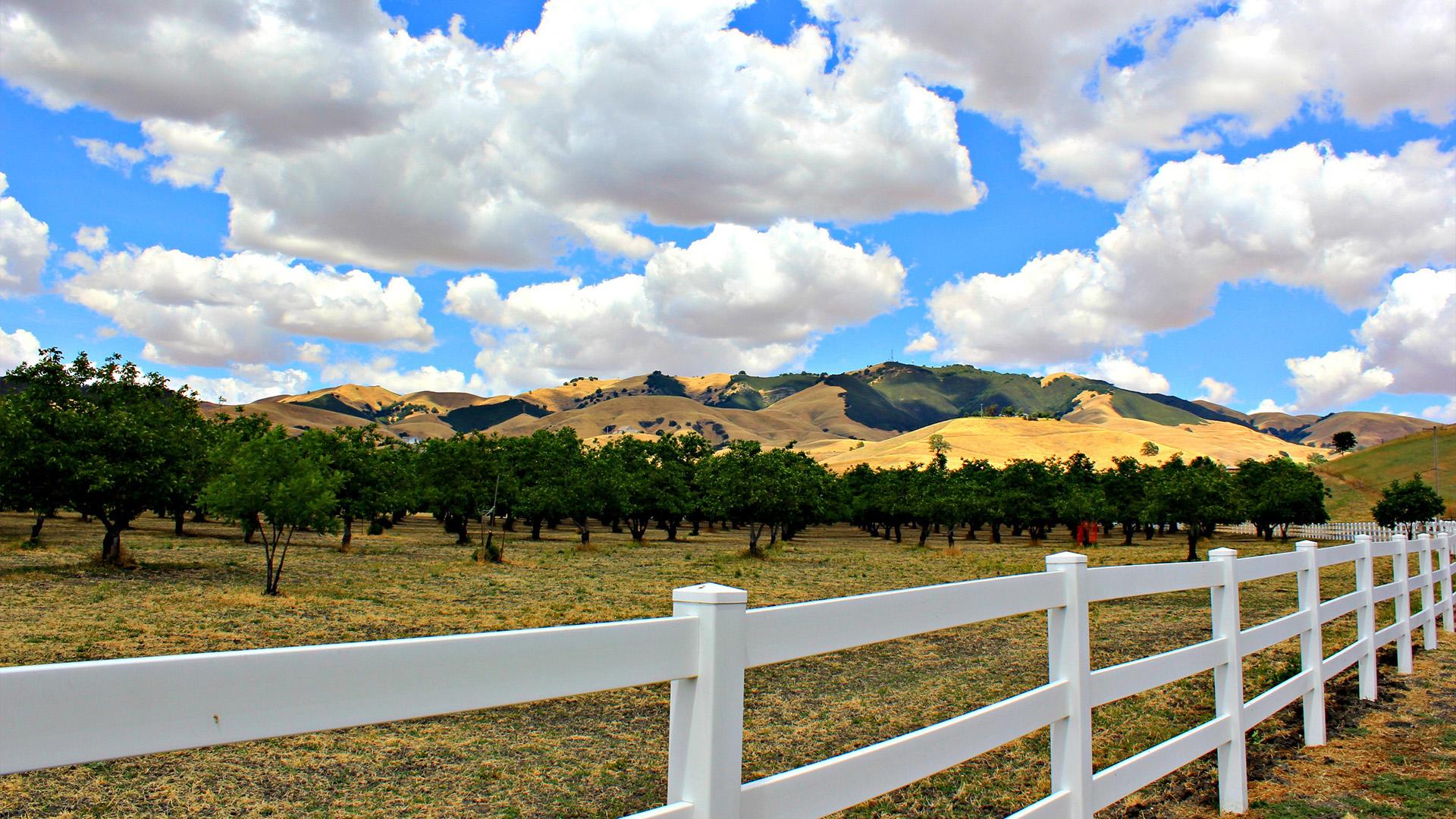 Tassajara Valley with white fence in foreground